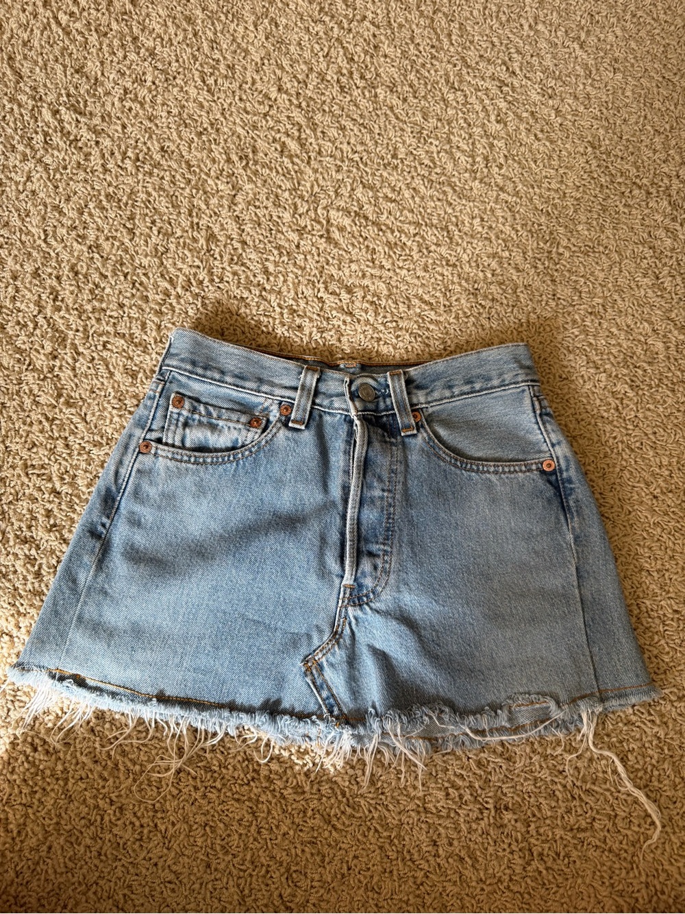 Light Wash Denim Mini Skirt with Frayed Hem